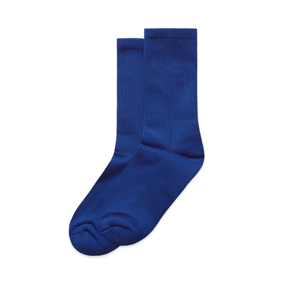 Pair of blue crew socks on a white background